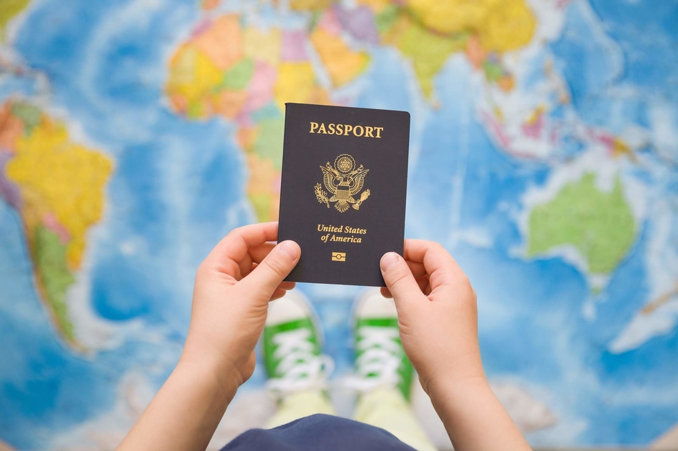 Child holding a passport
