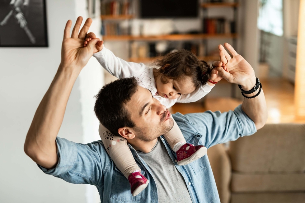 Father and daughter playing